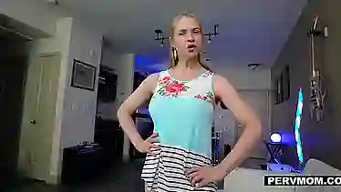 Big titted blonde mom is sucking her step- son's dick, while kneeling in front of him