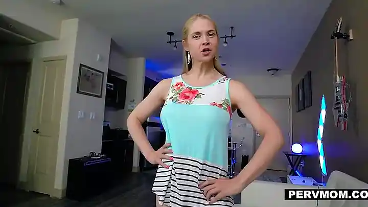 Big titted blonde mom is sucking her step- son's dick, while kneeling in front of him