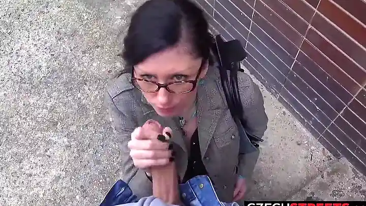 Mature Czech brunette with glasses is giving a blowjob to a stranger, to earn some cash