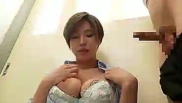 Young Japanese teacher helps her student