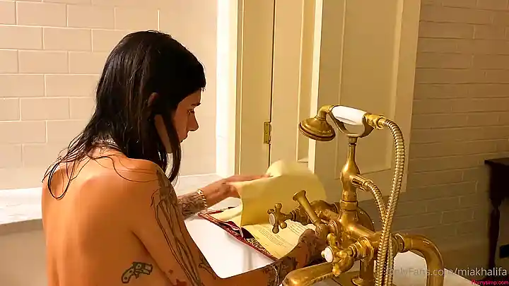 Mia Khalifa, the pornstar, shows off her big ass and 18 tits in POV action!
