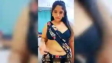 Watch Anu Tango strip down and tease with her big tits and ass in hot homemade video